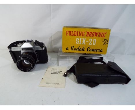 Photography - a lot to include a Chinon CX camera and a folding Brownie Six-20 camera contained in original box Est £20 - £40