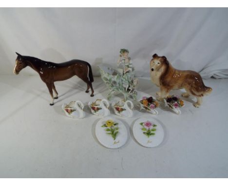 A lot to include Beswick horse, European ceramic center piece, Royal Albert Old Country Roses, Cooper Craft model of a dog an