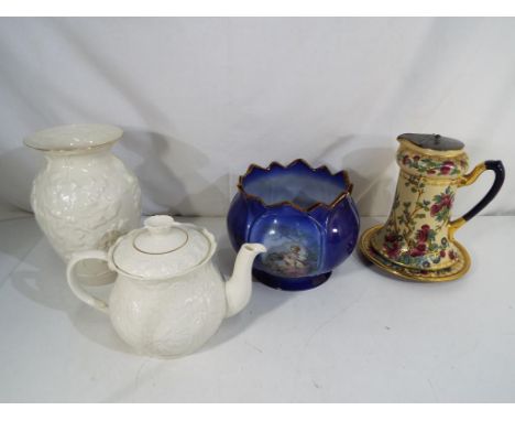 A Belleek oak leaf vase approximately 20.5 cm (h), a Belleek Serenity teapot, a ceramic coffee pot on stand and ceramic jardi