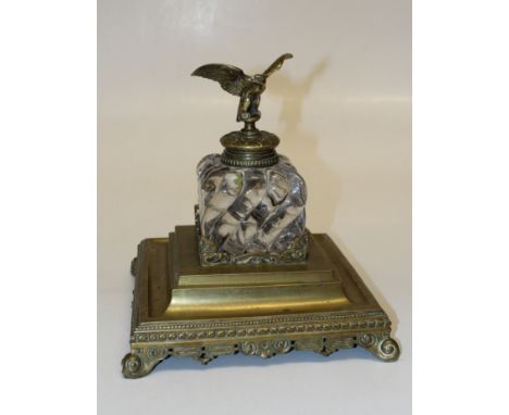 A massive 19th century Continental gilt bronze inkstand, eagle finial to the hinged cover, wrythen moulded well, stepped squa