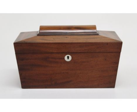 A Victorian mahogany sarcophagus form tea caddy, with twin lidded interior. 29cm wide&nbsp;