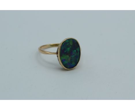 A black opal ring, circa 1880, size Q, 18carat. 2.59gm