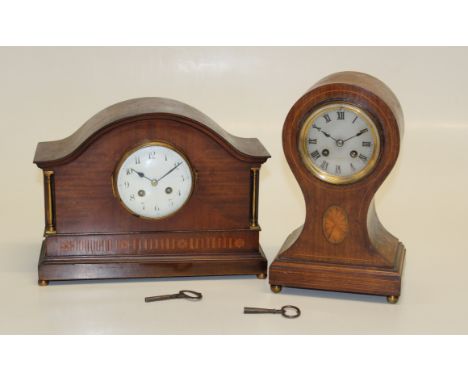 An Edwardian mahogany mantle clock, the domed case enclosing a gong striking French movement, faced by enamel Arabic dial, 33