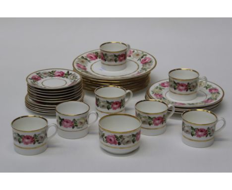 A set of six Wedgwood 23cm diameter plates, each florally decorated in iron red, impressed and printed urn marks, together wi