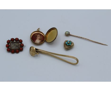 A selection of jewellery. One tie pin set with fine black opal, one tie clip with hexagonal scroll engraved top, one mourning