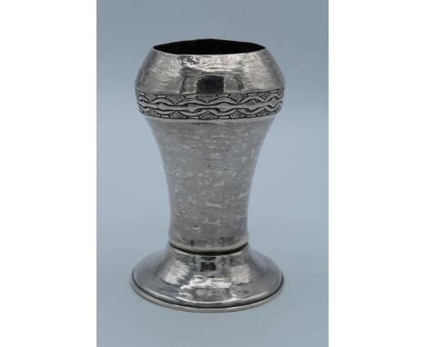David and Maurice Davis, an Edwardian silver bulb form vase of Arts and Crafts taste, with hammered waisted body, Celtic band