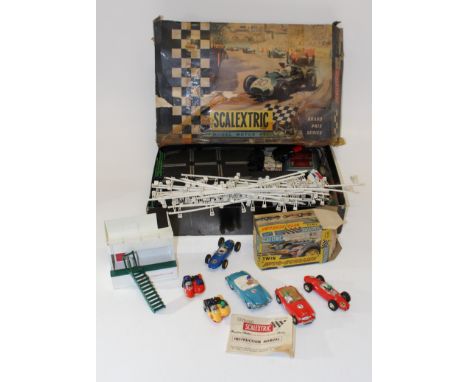 &nbsp;Scalextric Grand Prix Series set, model GP33. Two motorcycles with sidecar, Aston Martin, Mercedes, Ferrari and Lotus v
