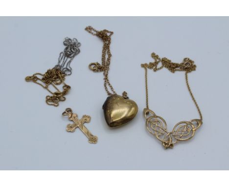 A collection of gold neckwear to include two 18ct gold chains, one white gold. Total weight 3.36gm. One crucifix, 2.5 x 1.5cm