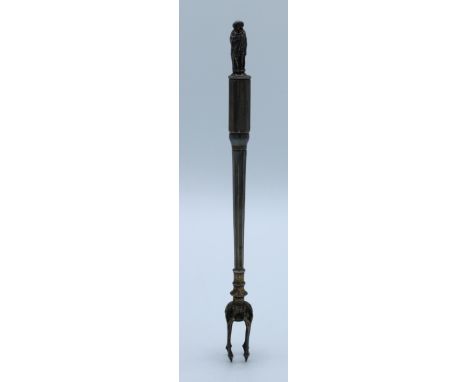 An early 20th century Elkington EP pickle fork with apostle terminal sprung mechanism, 19cm