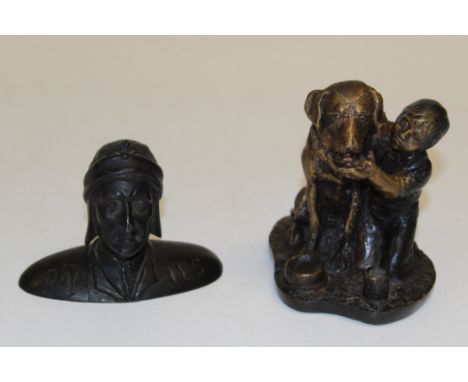 A 20th century hollow cast bronze bust of Dante Alighieri, 7cm high, together with an Austrian bronze group of a boy and dog 