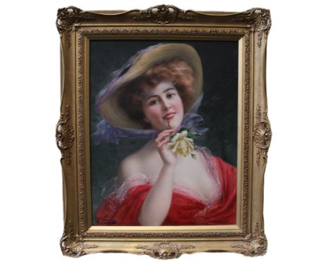 Emile Vernon ( British 1872-1919) Portrait of a Beauty, bust length, holding a yellow rose. Oil on canvas, signed lower left.