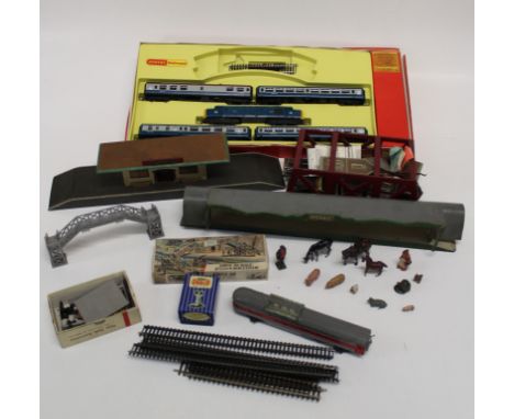 A box of assorted railway accessories including 2-rail track, card buildings, colour light junction signal etc, stations, lea