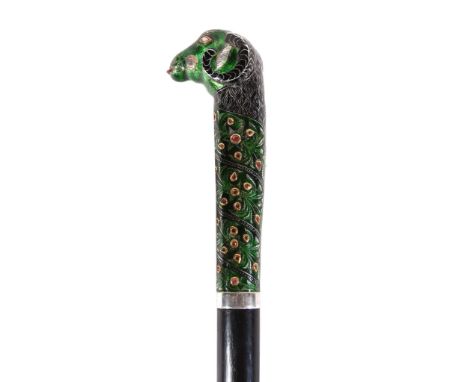  An Indian silver, enamel and gem set walking stick,   the handle formed as a ram's head, inset with rubies, on a green folia