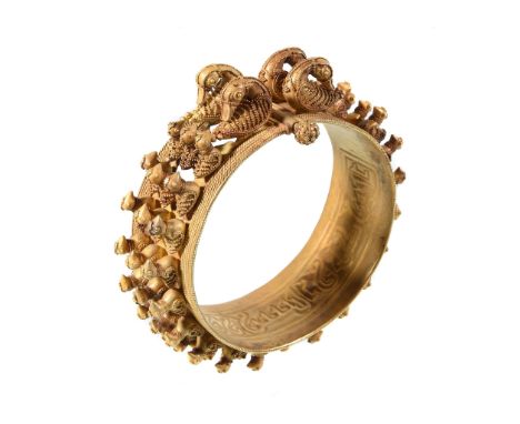  A gold granulated bangle,   Abbasid/Ilkhan period, the bangle with three rows of  granulated birds to two pairs of ducks by 