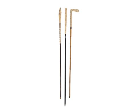 Ω A Cantonese carved ivory mounted bamboo walking stick, late 19th century, 83cm high; a Victorian carved ivory mounted walki