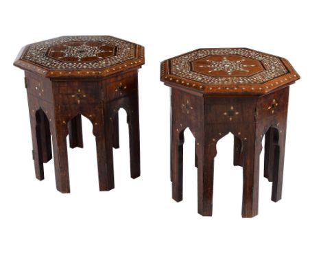 Ω A hardwood and inlaid occasional lamp table in Islamic taste , 70cm high, 47cm square, together with two similar octagonal 