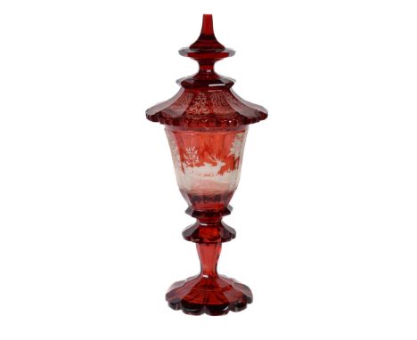  A large Bohemian ruby-flash goblet and a cover,   third quarter 19th century, the tapered decagonal  bowl engraved with deer