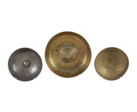  Three talismanic Persian metal bowls,   18th or 19th centuries, one with Sotheby's lot ticket 552 but undated, 20cm; 14.5cm 