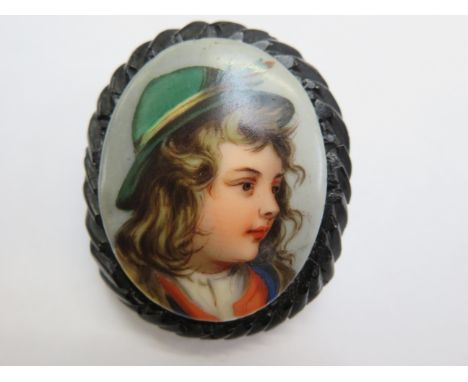 Whitby jet carved portrait brooch 