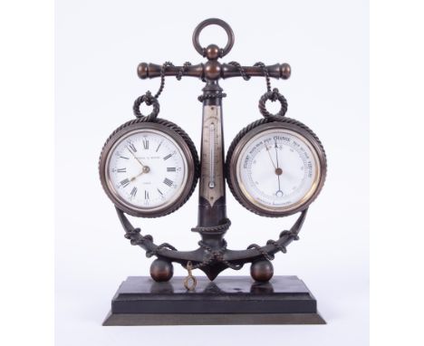 A Victorian combination clock/barometer/thermometer in brass anchor design mount, on brass-mounted black marble base, height 