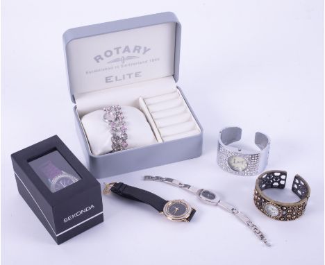 A selection of ladies watches to include a Rotary Elite with pink mother of pearl face and a matching bracelet, Sekonda with 