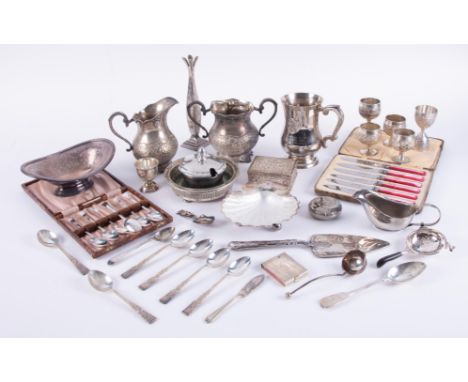 A collection of silver plated wares including tankards, flatware, caddy spoon, cased dessert knife sets, various objects, als