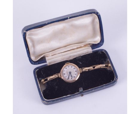 A vintage 9ct yellow gold hexagonal faced Bentima ladies wristwatch on a gold stretch bracelet stamped 9ct gold, metal lined,