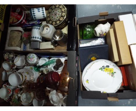 A good mixed lot of tableware to include two teasets, one by Gladstone, commemorative ceramic plates, vintage tins, a glass l