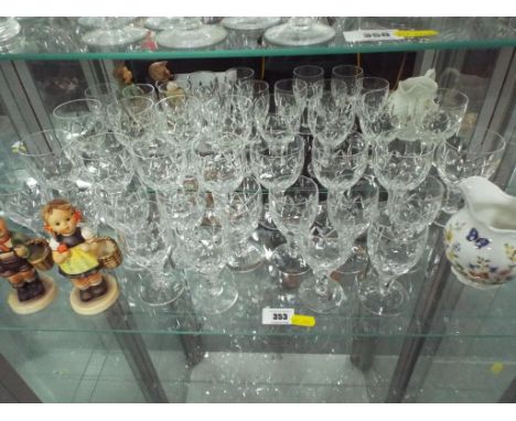 A good collection of cut glass crystal comprising eight wine glasses and twelve sherry glasses - included in the lot are two 