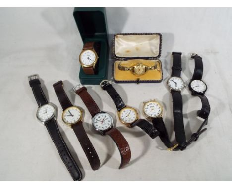 A collection of gentleman's modern wristwatches to include Timex, Limit, Kabana and a lady's vintage yellow metal wristwatch 