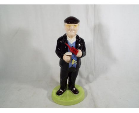 Lorna Bailey - a Lorna Bailey ceramic figure depicting Fred Dibnah, approximate height 27 cm (h). Estimate £30 - £50