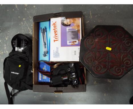 A mixed lot to include a Canon camera T50 with case, a Jessops camera tripod, boxed, a tripod in carry case, a Trivetek elect