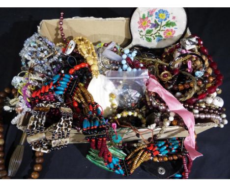 A box containing a large quantity of costume jewellery to include beaded necklaces, vintage watch by Timex, a digital Pepper 