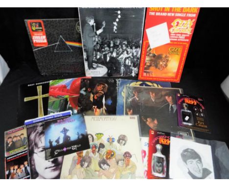 A lot to include two 33 rpm vinyl records by the Rolling Stones, comprising Rolling Stones #2, Metamorphosis, Black Sabbath 4