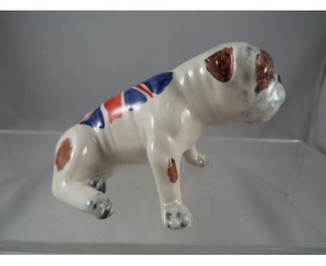 A ceramic Carlton Ware bulldog figurine.