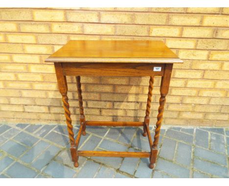 A light oak rectangular side table
