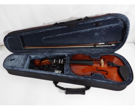 An Allieri VL144 full size violin with bow contained in protective case, violin body length 35.5 cm, paper label within scrib