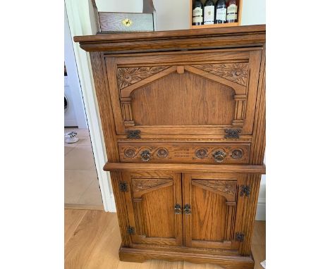 Andrena furniture - a carved light oak wine cabinet # 840, 120 cm x 78 cm x 41 cm