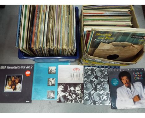 Two boxes of 33 rpm vinyl records to include ABBA, Dire Straits, Van Halen, Rolling Stones and similar [2]. 