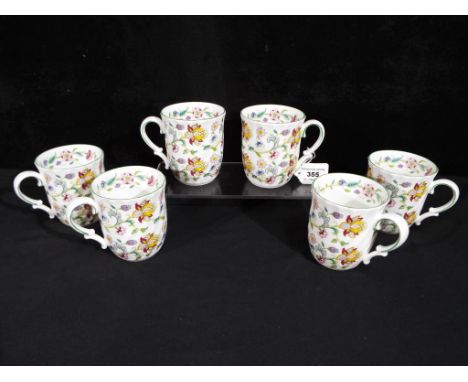 Minton - a set of six Minton ceramic mugs in Haddon Hall pattern, Est £20 - £40.