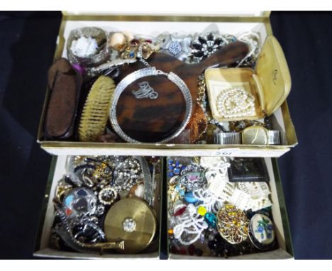 A jewellery box containing a quantity of good quality vintage costume jewellery, a white metal eastern style bangle, powder c