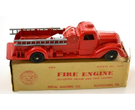 Metal Masters Diecast Fire Engine including driver and two ladders in original box 10'', 27cm (E box G, end flap detached) 