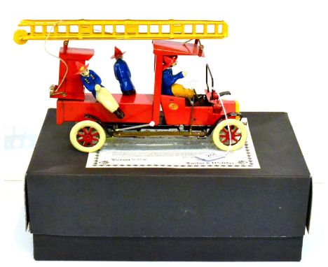 Tucher & Walther Fire Engine with three figures, raising ladder and roof over cab, in original box dated 12/03/86 (E box G-E)