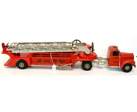 Smith Miller Articulated Turntable Fire Escape in Smith Miller Fire Department livery with three part ladder and extending st