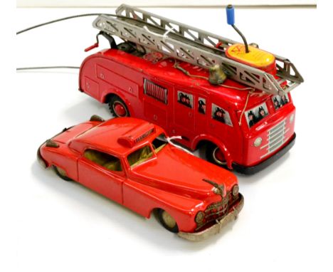 Arnold 50th Anniversary (1906-1956) Fire Engine with hand wound remote control, lithographed figure in windows and two part l