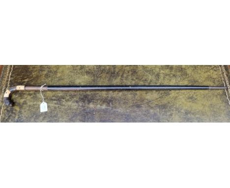 A 19th century swordstick,&nbsp;the 68cm blade having section of etched decoration, with bone and horn grip.&nbsp; Ensuite wi