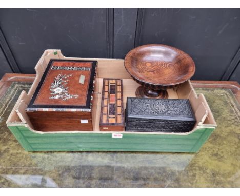 A small Indian carved ebony casket; 23.5cm wide; together with a parquetry cribbage board; a Victorian inlaid work box; and a