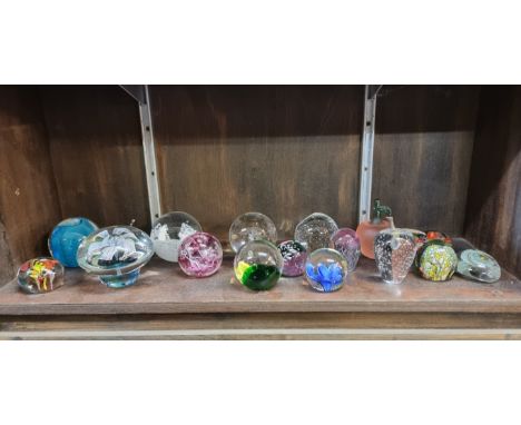 Seventeen glass paperweights, to include examples by Caithness. (17)&nbsp; 