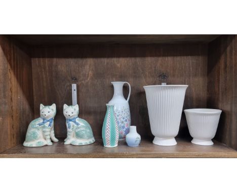 A mixed group of pottery and porcelain, comprising: two Wedgwood white glazed vases, largest 20.5cm high; a Poole vase, 14.5c