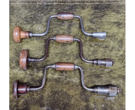 Tools:&nbsp;three early 8in braces, each with turned wood head and handle. 